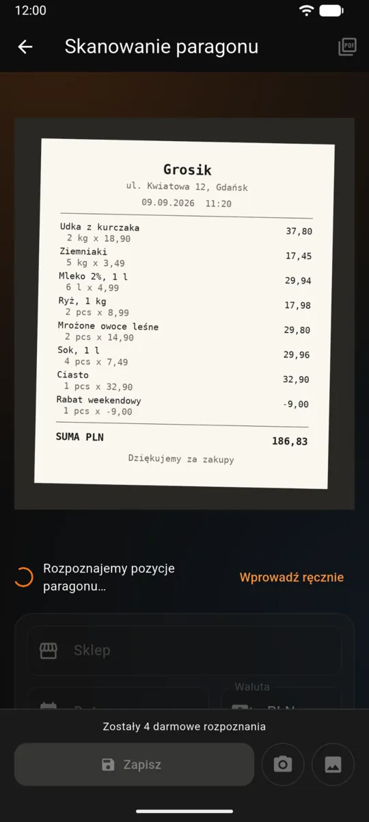 Ekran aparatu w Traty wycelowany w papierowy paragon